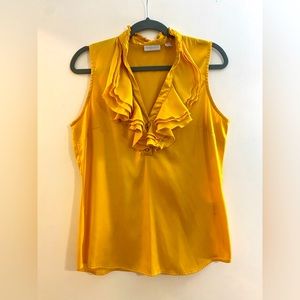 Gold ruffle sleeveless blouse